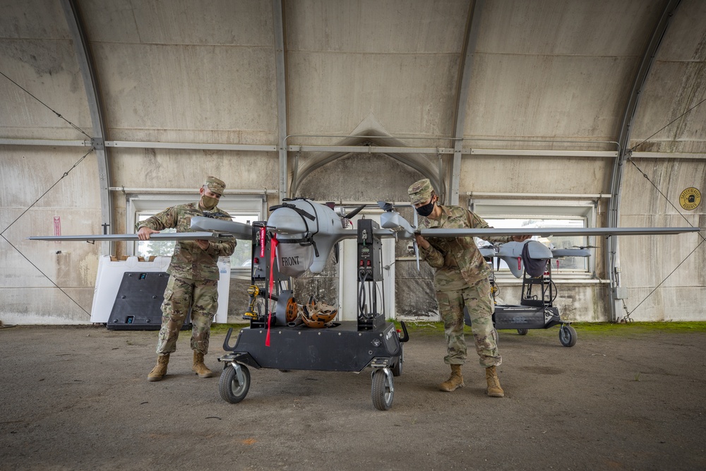 Soldiers from the 3rd Armored Brigade Combat Team, 1st Armored Division, Fort Bliss, Texas conduct pre-flight inspections on the L3Harris FVR-90 unmanned aircraft system