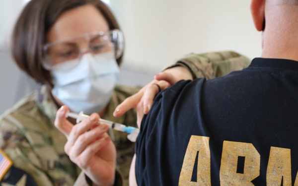 US Army Nurse Administers Covid-19 Vaccine to Retirees