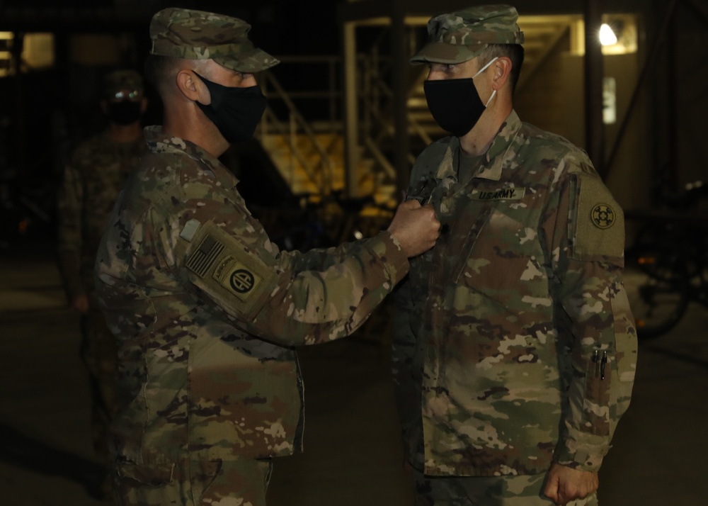 Family watches livestream from Kuwait as CG pins LTC oak leaf on chaplain