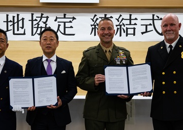 Col. Lance Lewis and Yoshihiko Fukuda co-sign Atago Humanitarian Assistance Local Implementation Agreement