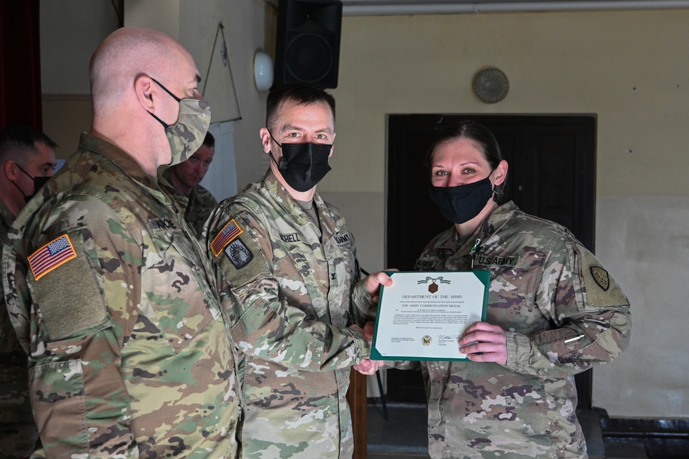 Alaska Army National Guard Staff Sergeant Corine Barrera, 297th Regional Support Group, receives an Army Commendation Medal.