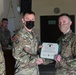 Alaska Army National Guard Sergeant Jacob Lunsford, 297th Regional Support Group, receives an Army Commendation Medal.