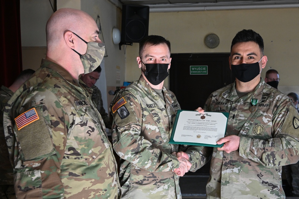 Alaska Army National Guard First Lieutenant Ivan Cuevas, 297th Regional Support Group, receives an Army Commendation Medal.