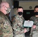 Alaska Army National Guard First Lieutenant Ivan Cuevas, 297th Regional Support Group, receives an Army Commendation Medal.