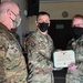 Alaska Army National Guard Sergeant Bradley Cunningham,297th Regional Support Group, receives an Army Commendation Medal.