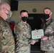 Alaska Army National Guard Chief Warrant Officer Four Mark Nieto, 297th Regional Support Group, receives an Army Commendation Medal.