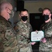 Alaska Army National Guard Sergeant 1st Class Paul Oliver, 297th Regional Support Group, receives an Army Commendation Medal.