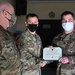 Alaska Army National Guard First Lieutenant Maxwell Severance, 297th Regional Support Group, receives an Army Commendation Medal.