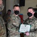 Alaska Army National Guard Specialist Jeremy Weller, 297th Regional Support Group, receives an Army Commendation Medal.