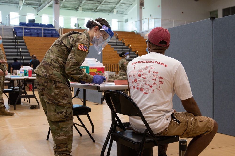 U.S. Virgin Islands community members receive vaccinations at the COVID-19 Community Vaccination Center