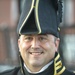 Lieutenant Commander Andrew Broyles poses for a photo onboard USS Constitution