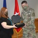 Brig. Gen. Dean receives pistol from General Officer Pistol Program