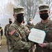 Alaska Army National Guard Captain Thomas Howard, 297th Regional Support Group, receives an Army Commendation Medal.