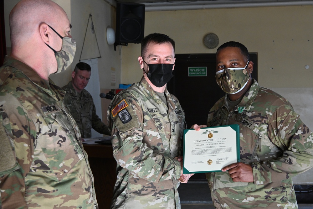 Maryland Army National Guard Sergeant First Class Bonilla, 729th Quartermaster Composite Supply Company, receives an Army Commendation Medal.