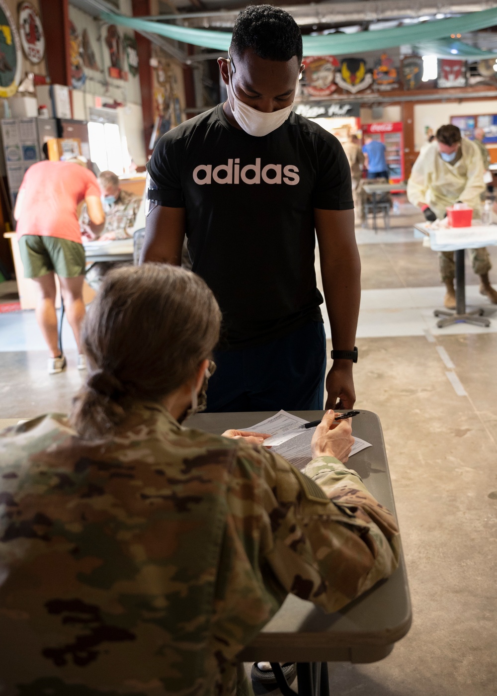 Medical personnel administer COVID-19 vaccine at Camp Lemonnier Djibouti