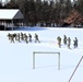 Fort McCoy CWOC class 21-04 students conduct field training in snowshoes, pulling sleds