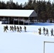 Fort McCoy CWOC class 21-04 students conduct field training in snowshoes, pulling sleds