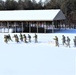 Fort McCoy CWOC class 21-04 students conduct field training in snowshoes, pulling sleds