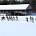 Fort McCoy CWOC class 21-04 students conduct field training in snowshoes, pulling sleds
