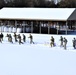 Fort McCoy CWOC class 21-04 students conduct field training in snowshoes, pulling sleds