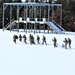 Fort McCoy CWOC class 21-04 students conduct field training in snowshoes, pulling sleds
