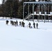 Fort McCoy CWOC class 21-04 students conduct field training in snowshoes, pulling sleds