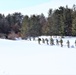 Fort McCoy CWOC class 21-04 students conduct field training in snowshoes, pulling sleds