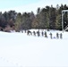 Fort McCoy CWOC class 21-04 students conduct field training in snowshoes, pulling sleds
