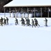 Fort McCoy CWOC class 21-04 students conduct field training in snowshoes, pulling sleds