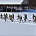 Fort McCoy CWOC class 21-04 students conduct field training in snowshoes, pulling sleds