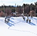 Fort McCoy CWOC class 21-04 students conduct field training in snowshoes, pulling sleds