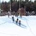 Fort McCoy CWOC class 21-04 students conduct field training in snowshoes, pulling sleds