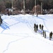 Fort McCoy CWOC class 21-04 students conduct field training in snowshoes, pulling sleds