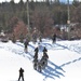Fort McCoy CWOC class 21-04 students conduct field training in snowshoes, pulling sleds