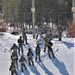 Fort McCoy CWOC class 21-04 students conduct field training in snowshoes, pulling sleds