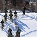 Fort McCoy CWOC class 21-04 students conduct field training in snowshoes, pulling sleds