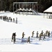 Cold-Weather Operations Course class 21-04 students conduct field training in snowshoes, pulling sleds