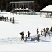 Cold-Weather Operations Course class 21-04 students conduct field training in snowshoes, pulling sleds