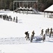 Cold-Weather Operations Course class 21-04 students conduct field training in snowshoes, pulling sleds