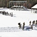 Cold-Weather Operations Course class 21-04 students conduct field training in snowshoes, pulling sleds