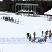 Cold-Weather Operations Course class 21-04 students conduct field training in snowshoes, pulling sleds