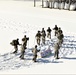 Cold-Weather Operations Course class 21-04 students conduct field training in snowshoes, pulling sleds