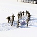 Cold-Weather Operations Course class 21-04 students conduct field training in snowshoes, pulling sleds