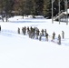 Cold-Weather Operations Course class 21-04 students conduct field training in snowshoes, pulling sleds