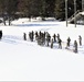 Cold-Weather Operations Course class 21-04 students conduct field training in snowshoes, pulling sleds