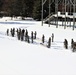 Cold-Weather Operations Course class 21-04 students conduct field training in snowshoes, pulling sleds