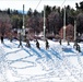 Cold-Weather Operations Course class 21-04 students conduct field training in snowshoes, pulling sleds
