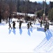 Cold-Weather Operations Course class 21-04 students conduct field training in snowshoes, pulling sleds