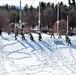 Cold-Weather Operations Course class 21-04 students conduct field training in snowshoes, pulling sleds