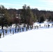 Cold-Weather Operations Course class 21-04 students conduct field training in snowshoes, pulling sleds